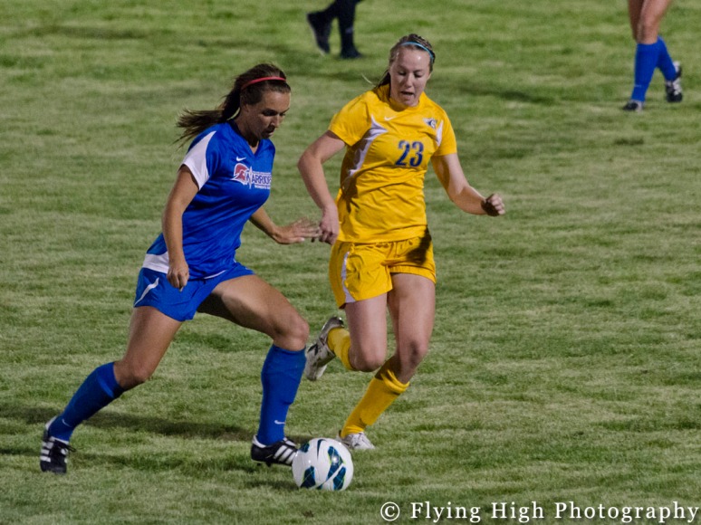 Kalyn Goodenough about to steal the ball from jessup
